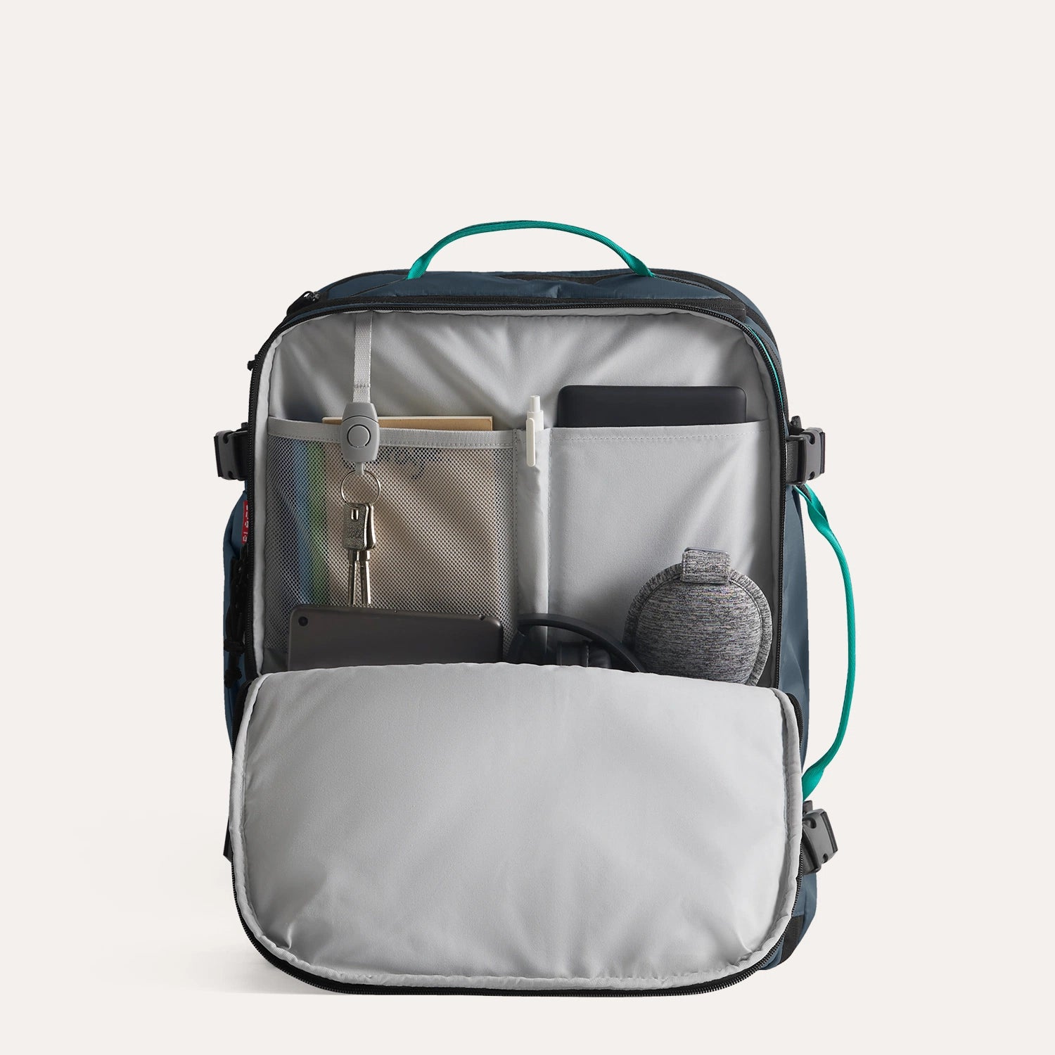 Blast_40L_travel_backpack-in-navy-blue_58a7a39e-2656-48ec-a51f-ed693432842e